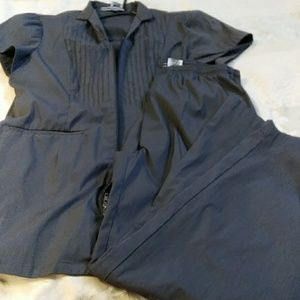 Women's scrubs size Large fits 14